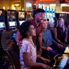 Filipino player using ph555 on a smartphone to access sports betting and slots